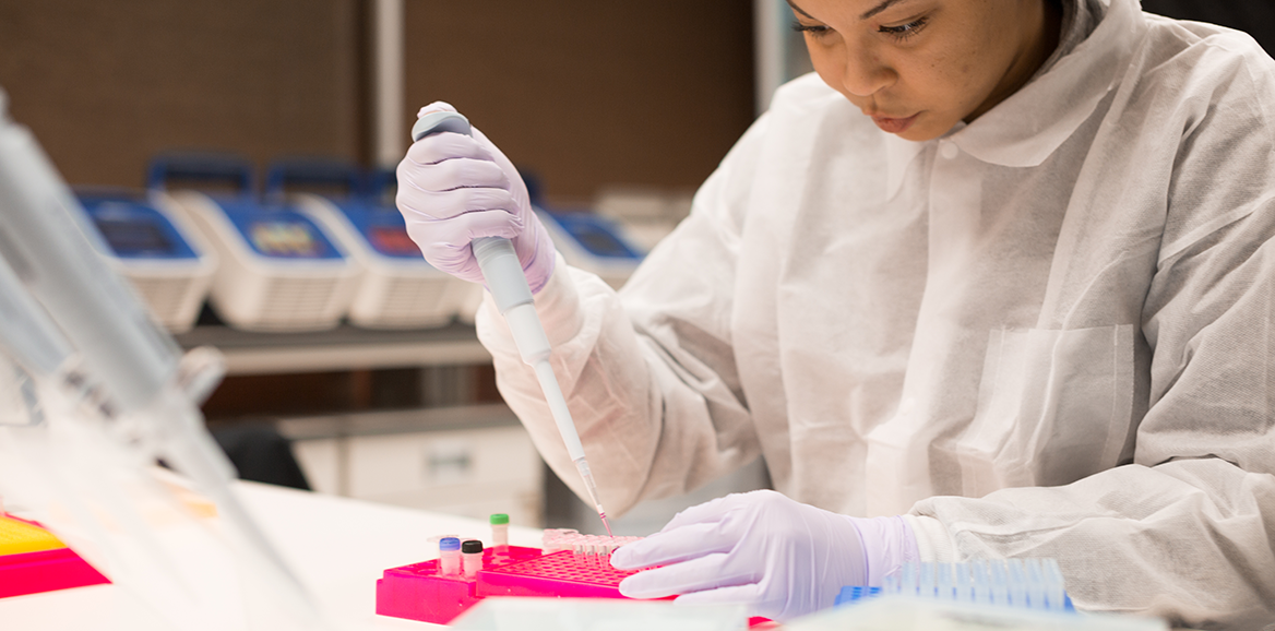 A Molecular Pathology student working in the lab.